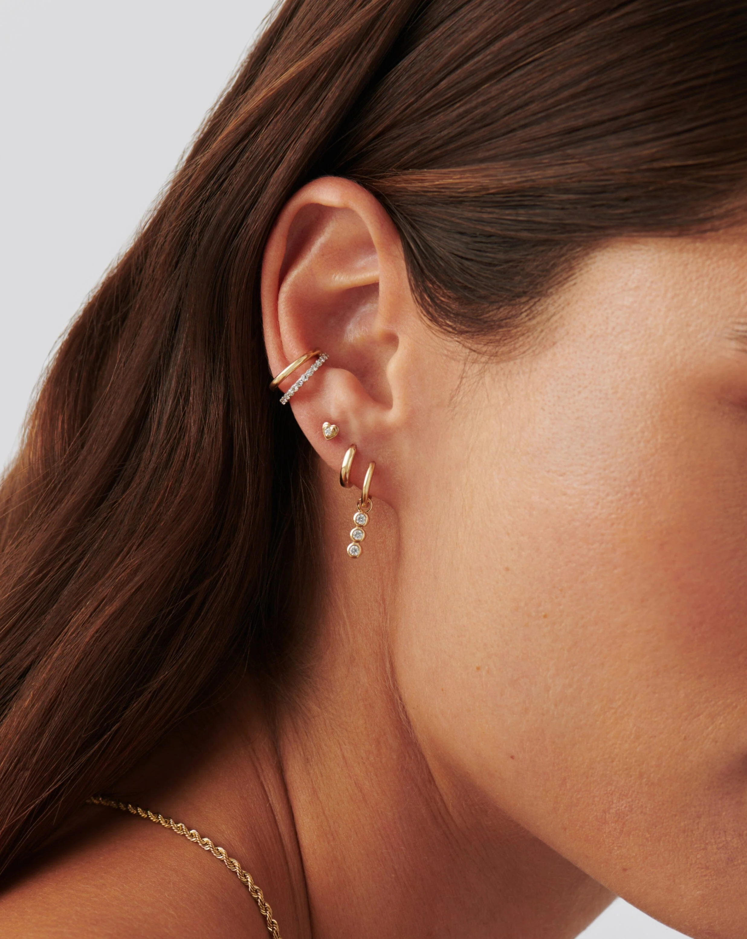 Solid Gold Diamond Heart Stud Earrings - Image 6