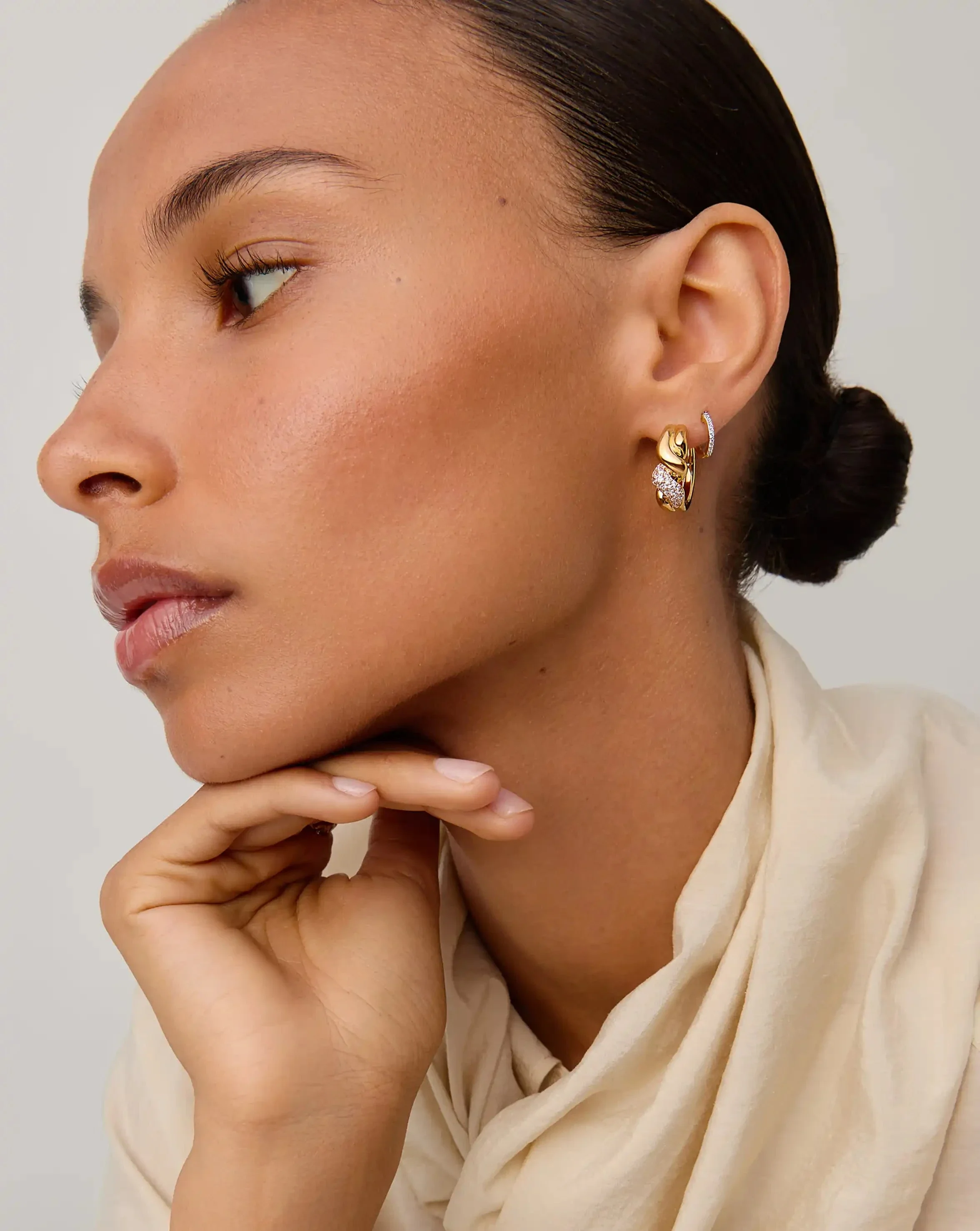 Molten Snow Twisted Small Hoop Earrings | 18k Gold Plated/Cubic Zirconia - Image 2